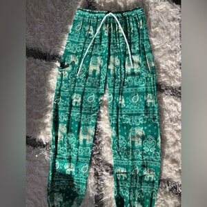 EARTHBOUND Green Elephant Print Track Pants